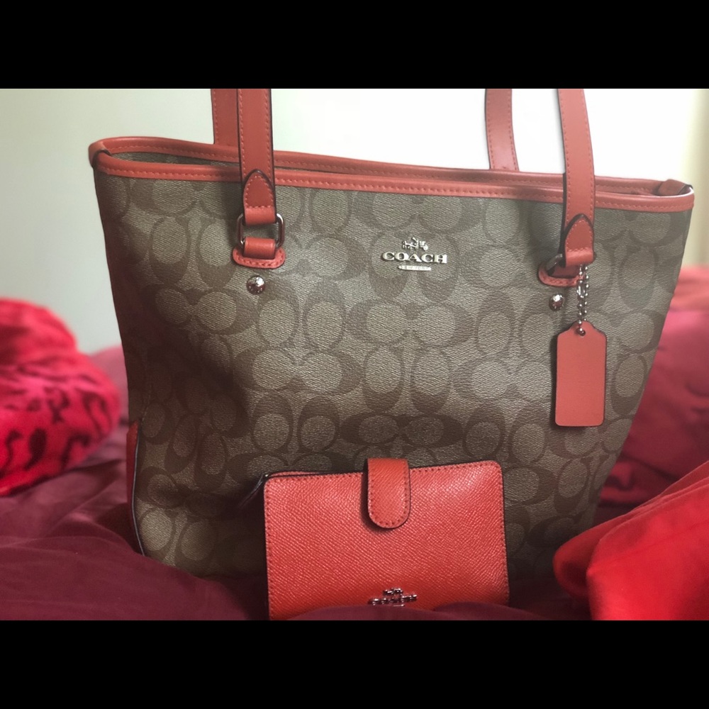 Beautiful orange coach set (purse and wallet)